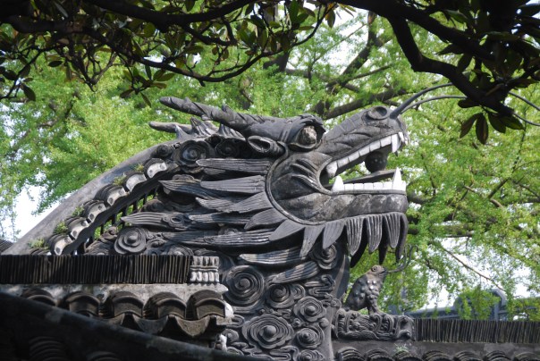 The 16th century Yu Yuan Garden - accented with huge stone dragons, rockeries. tea houses, ponds, and beautiful landscaping.  (photo by Robyn Bushong.)