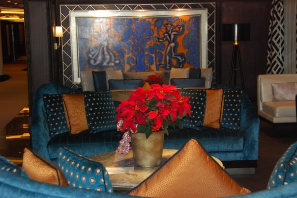 Giant red poinsettias accented the public areas throughout the ship. (photo by Robyn Bushong.)